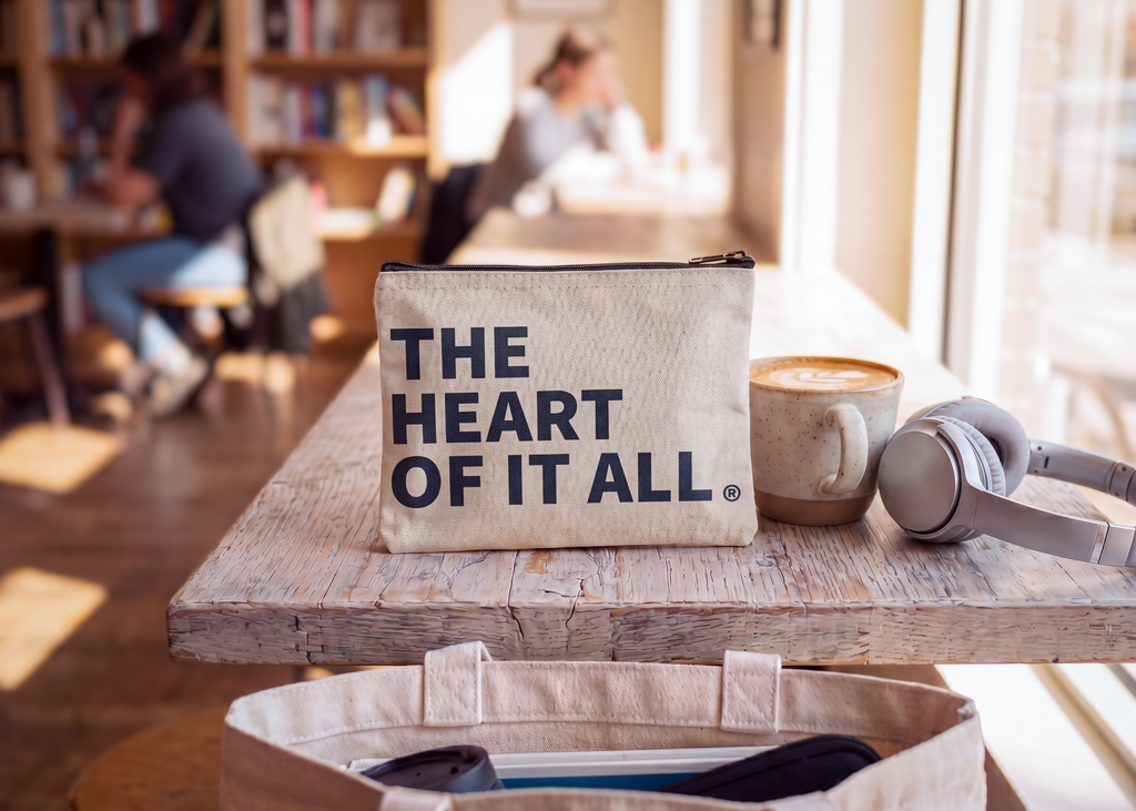 Ohio The Heart of it All — Recycled Canvas Zippered Pouch in a table
