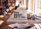 Ohio The Heart of it All — Recycled Canvas Zippered Pouch in a table